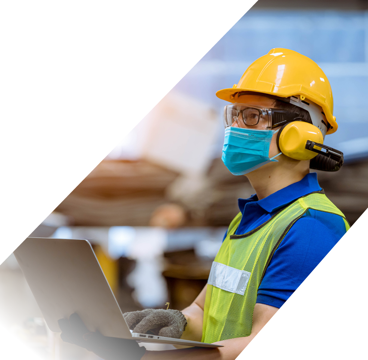 Portrait man worker under inspection and checking production process on factory station by wearing safety mask to protect for pollution and virus in factory 