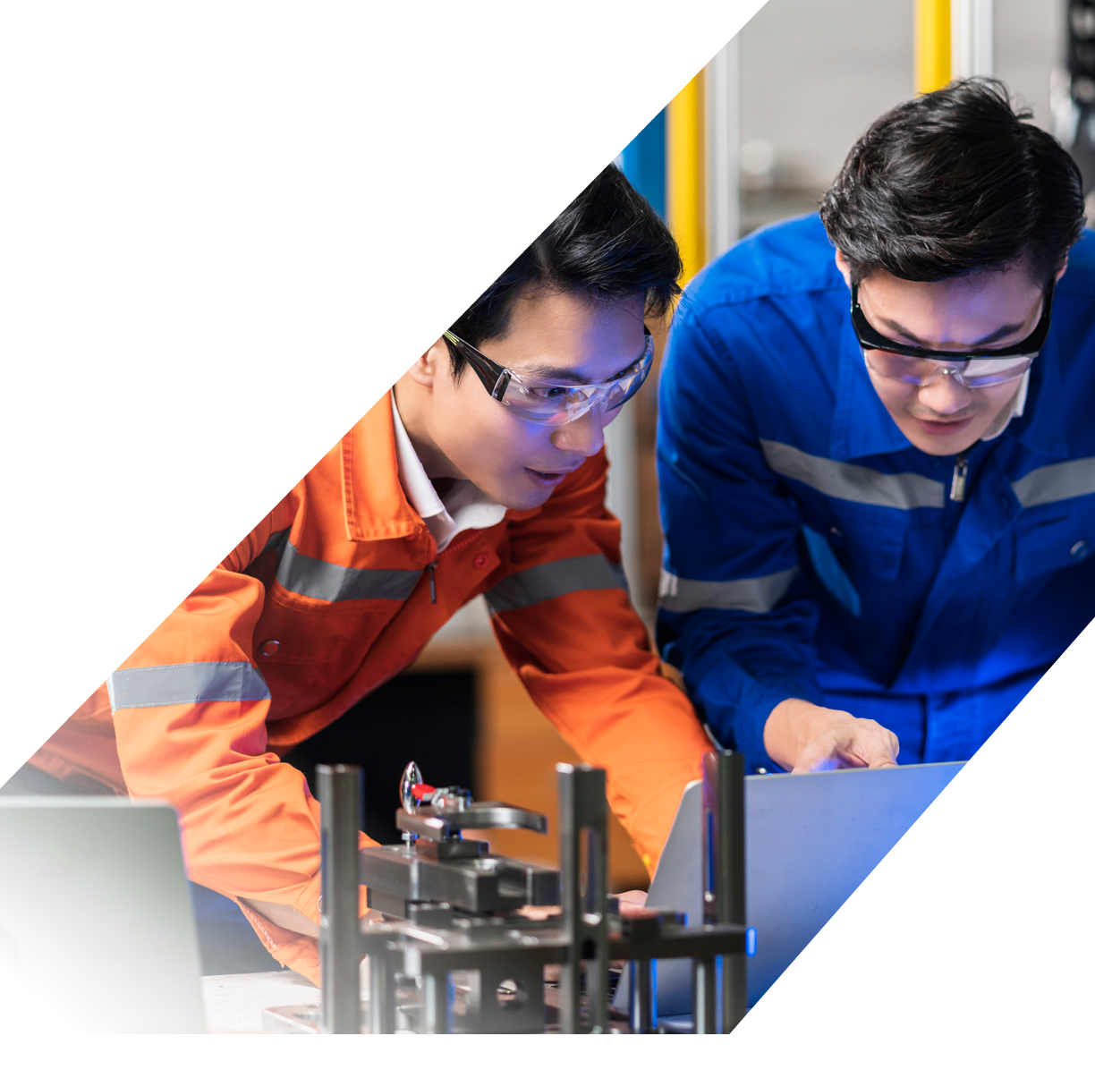 Male Asian engineer professional  having a discussion standing by the machine in the factory ,two asian coworker brainstorm explaining and solves the process curcuit mother board of the machine