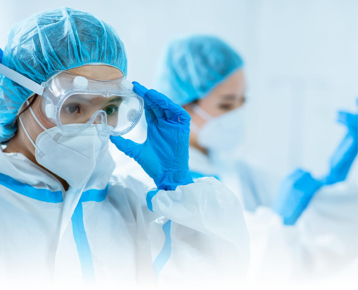 female medical worker wear protective suits and ready to take care of coronavirus patient in isolation room