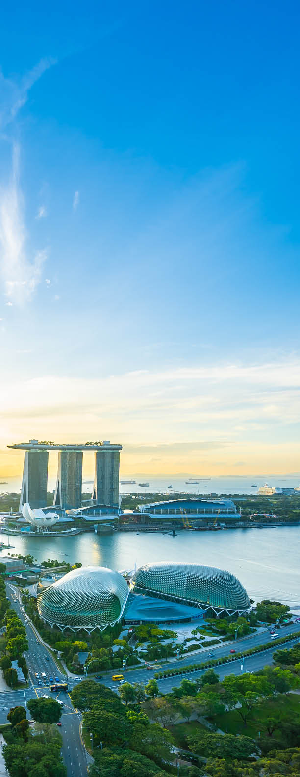 Beautiful architecture building exterior cityscape in Singapore city skyline at sunrise time