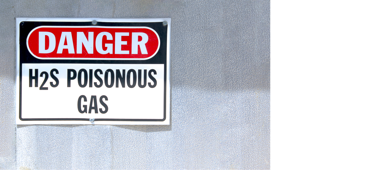 A Danger H2S Poisonous Gas sign on a Natural Gas facility.