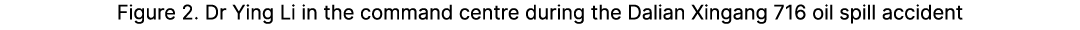Figure 2. Dr Ying Li in the command centre during the Dalian Xingang 716 oil spill accident